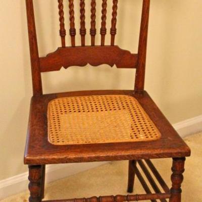 antique Colonial Revival oak side chair with spiral spindles