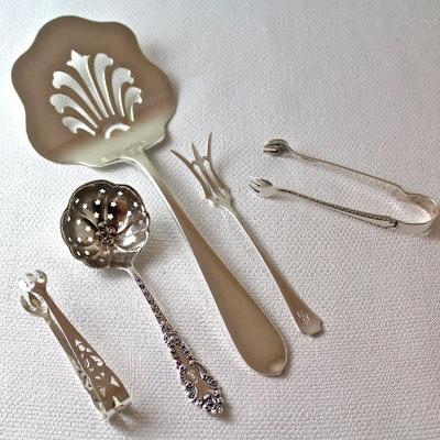 sterling serving pieces by Stieff, Wallace, and other makers