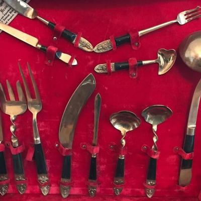 1950's Thai brass and rosewood flatware set  $650
