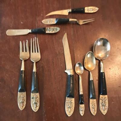1950's Thai brass and rosewood flatware set  $650