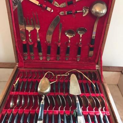 1950's Thai brass and rosewood flatware set  $650