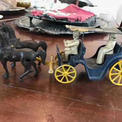 Caste iron Surrey with a trim on top $95