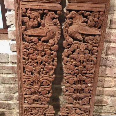 A pair of architectural features $55