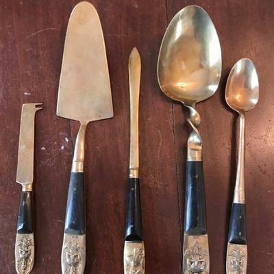 1950's Thai brass and rosewood flatware set  $650