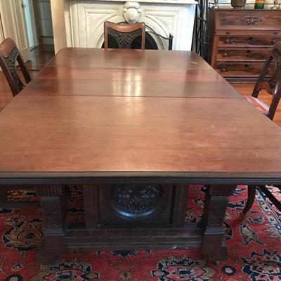 From Wisconsin an antique mahogany dining table with 8 leaves $2,500
62 X 51 X 30 1/2