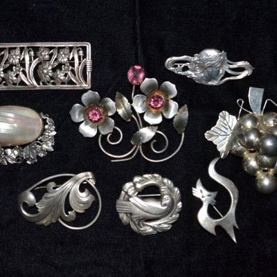 Sterling silver brooches