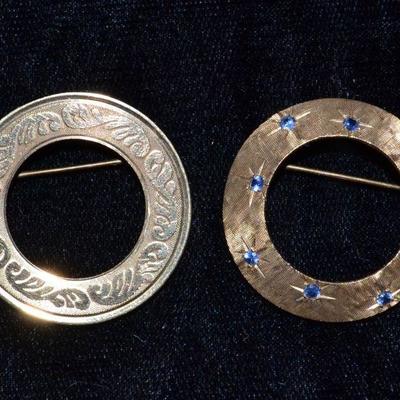 Gold brooches
