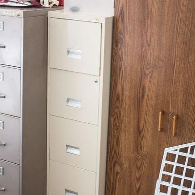 File cabinets and wooden cabinet.