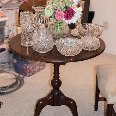 Round antique table and crystal.