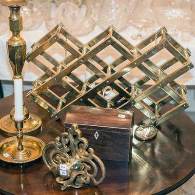 Vintage brass items and wine rack.