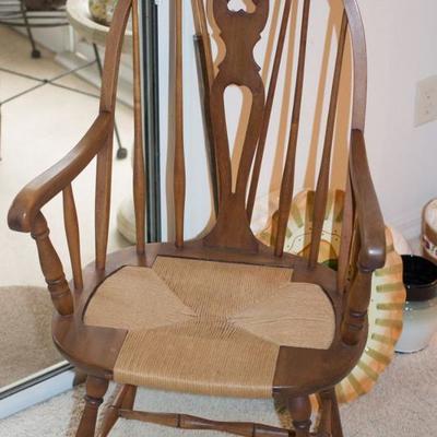 Windsor chair with rush seat.