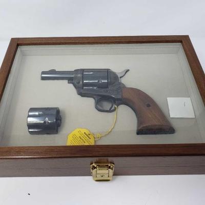 #137: Colt Sheriffs Model SAA .44 Cal Revolver with Wood Display Case
Serial Number: SA40667
Barrel Length: 3