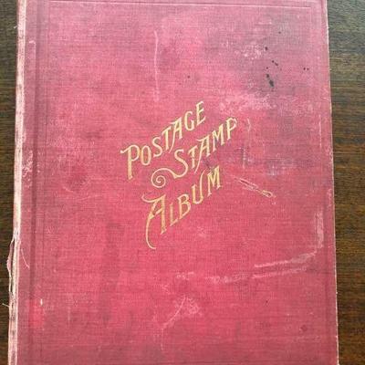 Antique postage stamp album