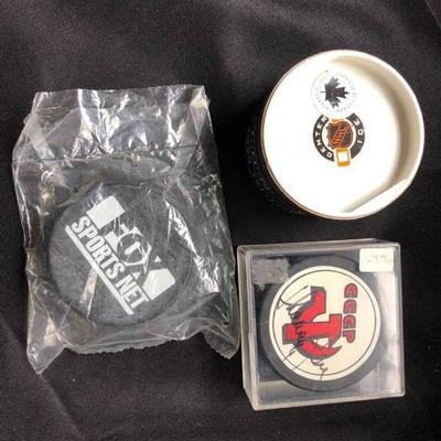 Vintage Autographed Russian hockey puck and two more