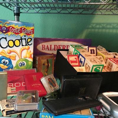 Cootie, building blocks, deck of cards
