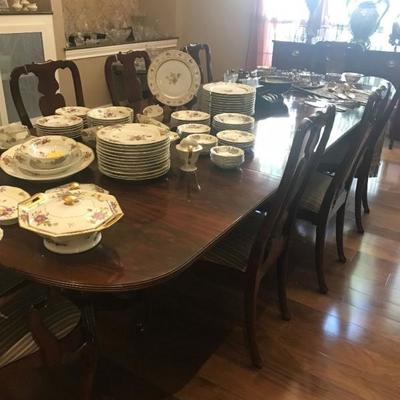 Kindel mahogany dining room table. Two leaves. 8 chairs (two of them are captain chairs). Like new. Chairs in excellent condition. (next...