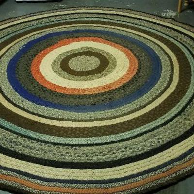 Large Hand braided rug.