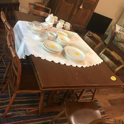 Dining room table and chairs. Folds out. Light brown. $375
