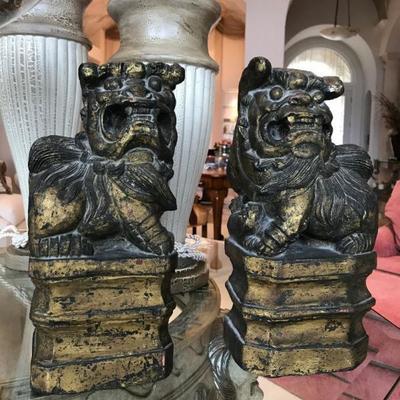 Foo dogs carved out of wood.