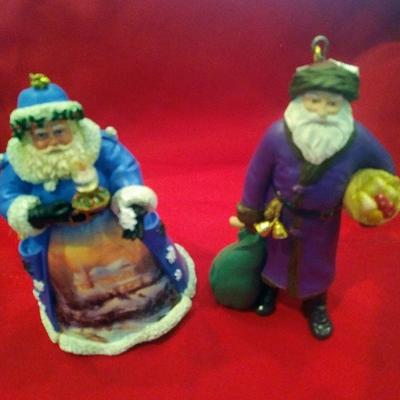 Left to right
1.  "Christmas night visit Santa" Old World Christmas by: Ashton-Drake $7.00
2.  Merry Olde Santa Purple Overcoat...