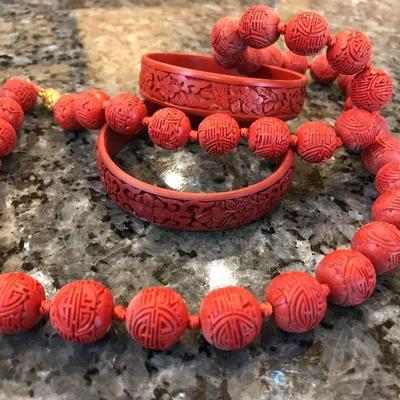 Vintage Asian cinnabar bangle bracelets ($75 each) and beaded necklace ($125)