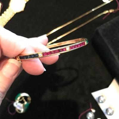 All jewelry reviewed and detailed by Jewelry Appraiser: 18K GOLD BRACELET WITH DIAMONDS, RUBIES AND SAPPHIRES. $1,750