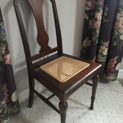 European antique chair matching the rest of the furniture in the room. $50