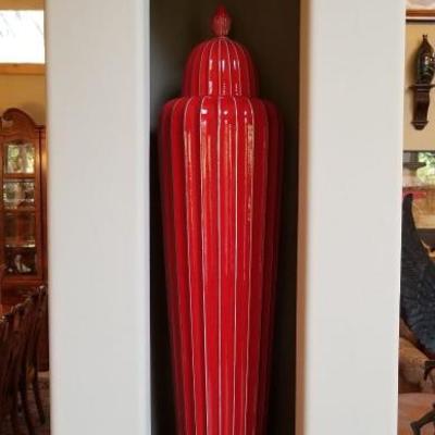 These extra large lidded red fluted jars are worth between $550 - $750 each. (We have 2) Each are over 4 feet tall!...