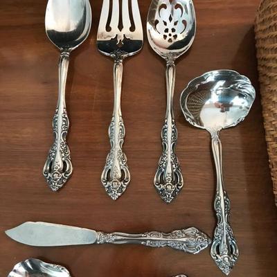 Oneida Stainless "Michelangelo" serving set. Knife, sugar spoon, serving ladle, serving spoon, pierced swerving spoon, pierced...