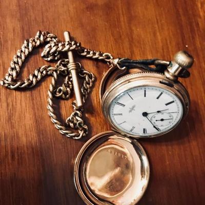 Lady's hunter case watch. Elgin Watch Co. Produced in 1889. One jewel. Gold filled. It is operating. Includes gold plated watch fob....
