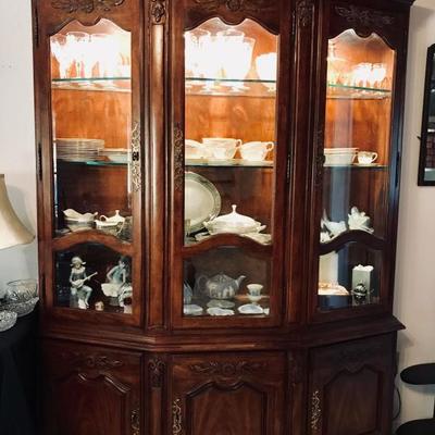 Gorgeous lighted china cabinet. $225