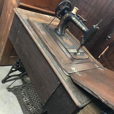 Vintage New Home sewing machine with table. First half of the 1900's. $220