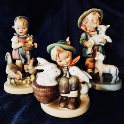 Hummel figurines. [left] $60 ... [center] $45 .... [right] $40