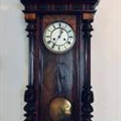 Vintage Mahogany wall clock. Includes key. 53