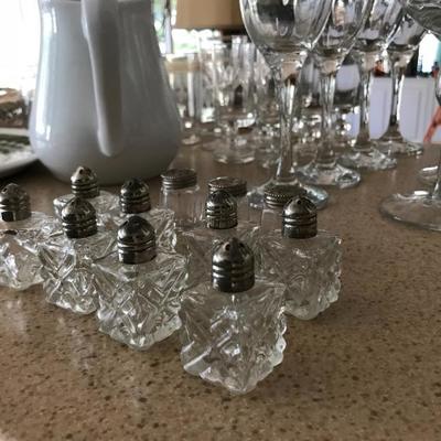 Vintage single serve salt shakers. 