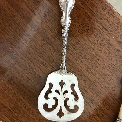 International Silver. Sterling Silver. Tomato server. Asking: $75