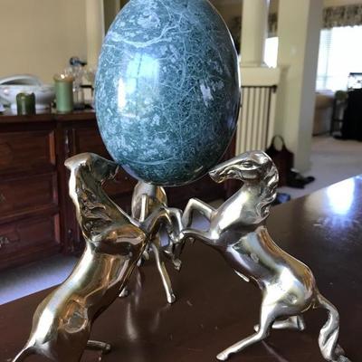 3 brass horses holding a large marble egg. Made in Korea.