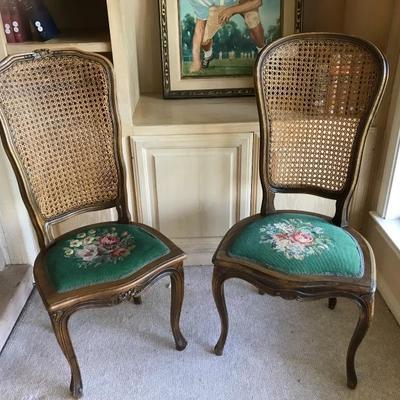 Vintage Louis XV style embroidered seats on both. Left one has a double layered cane back. And the right a single layer cane back.