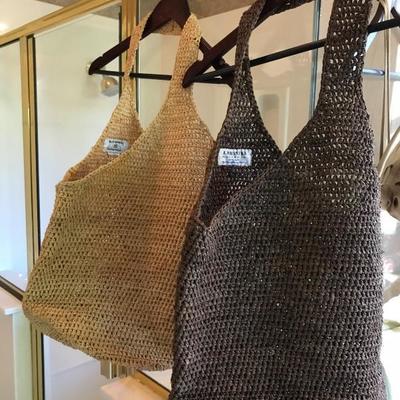 Helen Kaminski 100% pure raffia bags. Made in Madagascar.