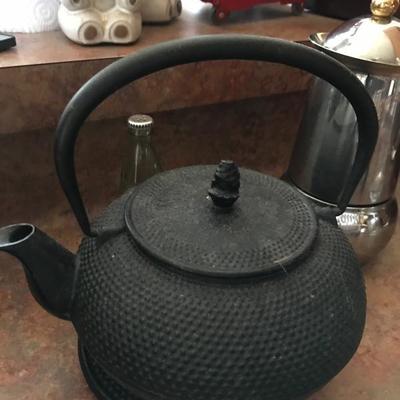 Vintage Chinese iron wrought tea maker. Price at Estate Sale: $12
