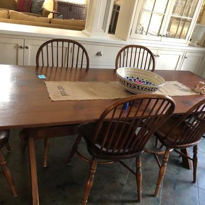 farm table and two chairs