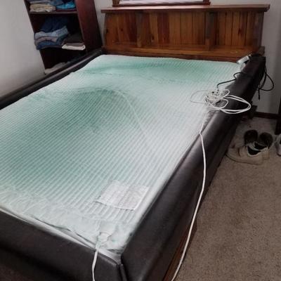 Waterbed. You must remove and KNOW HOW TO DO SO in order to buy.