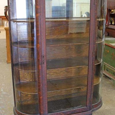  ANTIQUE Quartersawn Oak Paw Foot Carved China Cabinet with Curve Glass in original finish – auction estimate $300-$600 