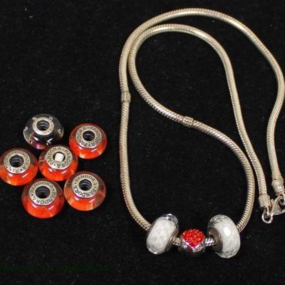  Pandora Marked 925 Necklace and Charms â€“ auction estimate $50-$100 