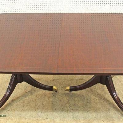  — BEAUTIFUL — 

Mahogany Double Pedestal Dining Room Table with Pencil Inlay Banding (46”w x 68” L ) with 4 Self Storing 12” Leaves...