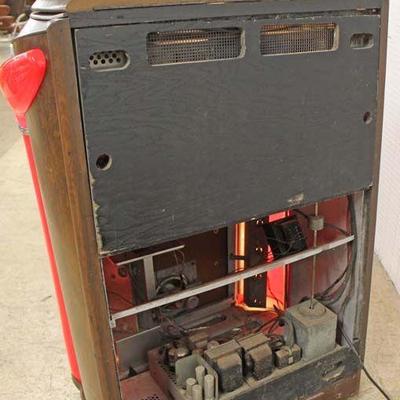 Semi Antique â€œSeeburgâ€ Juke Box in working order in original found condition â€“ auction estimate $1000-$3000 