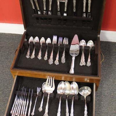  64 Piece Sterling Silver Flatware Set in Case by “Reed & Barton” approximately 80.7 ounces – auction estimate $1000-$2000 
