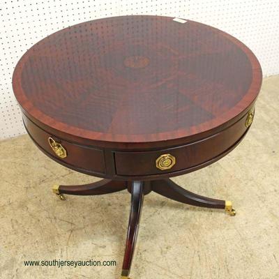 Burl Mahogany and Banded 2 Drawer Drum Table in Very Good Condition by â€œHickory Chair Companyâ€ â€“ auction estimate $300-$600 
