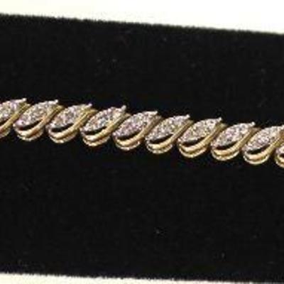  10 Karat Yellow Gold 1 CTW Diamond Tennis Bracelet â€“ auction estimate $500-$1000

  