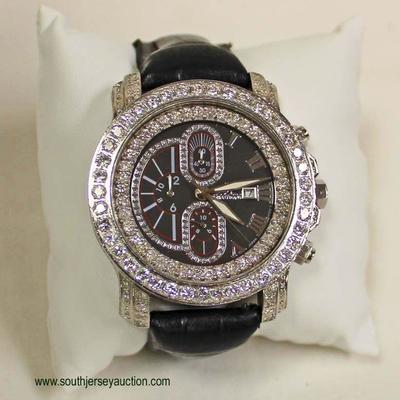   â€œJohnny Dangâ€ 10 CTW Diamond Watch

with Black Leather Band â€“ auction estimate $5000-$10000 